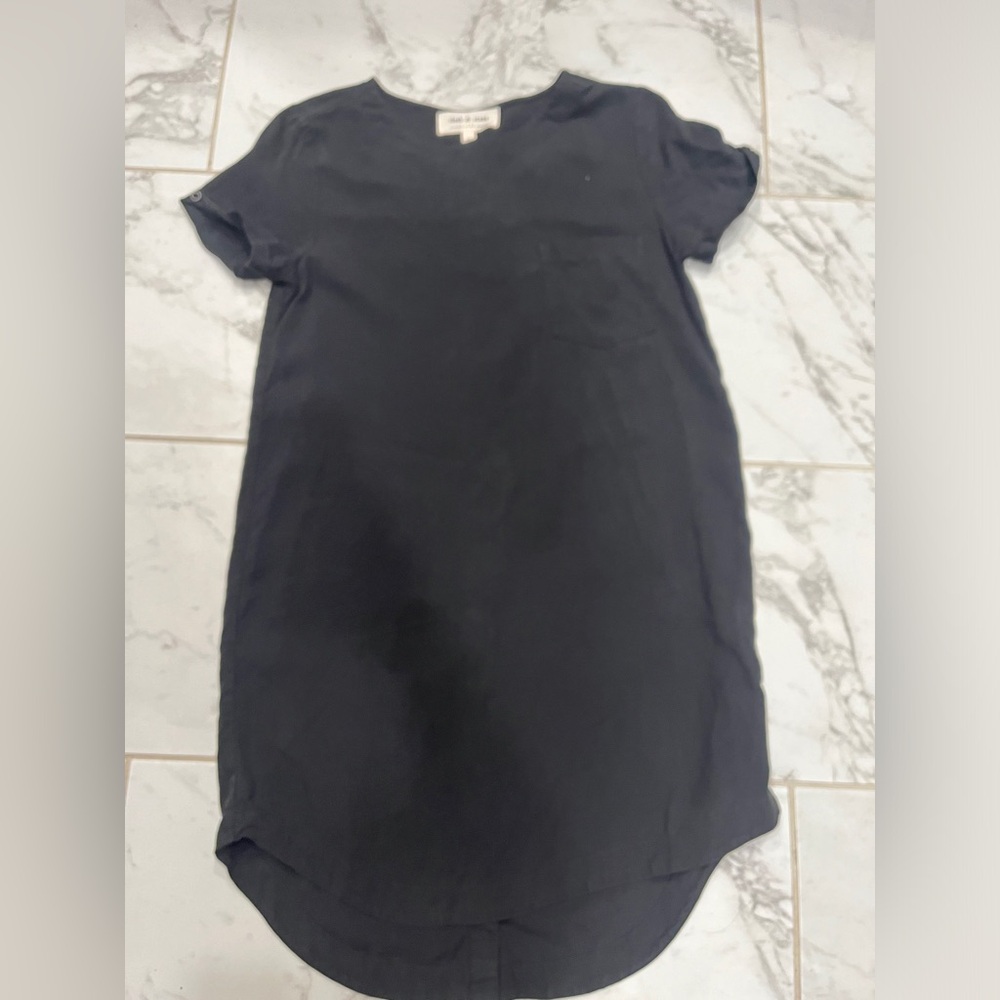 Black cloth and stone shirt dress with beautiful button detailing on the back.